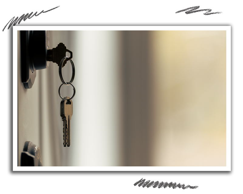 set of keys hanging from door lock