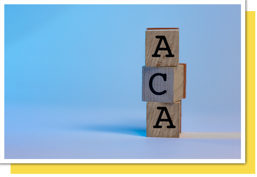 three blocks stacked on top of each other spelling ACA