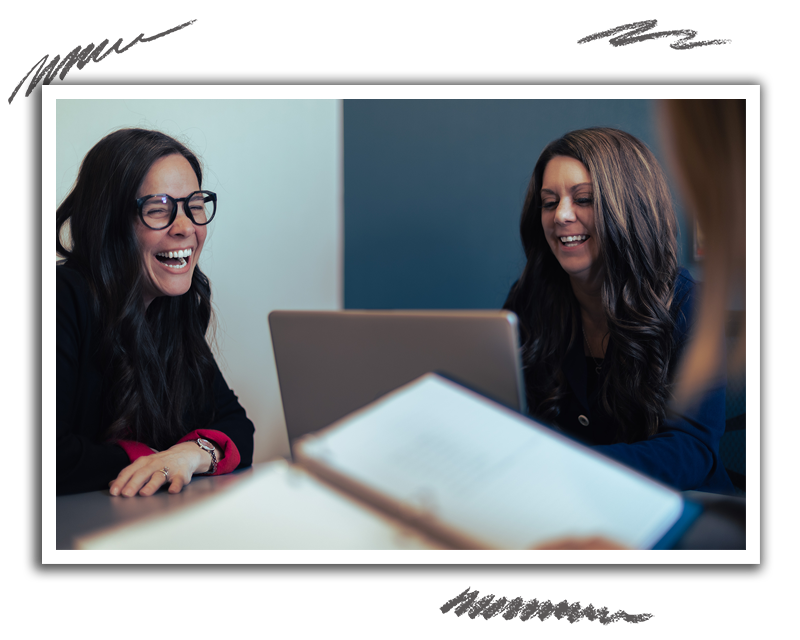 hr leader and two subordinates laughing during meeting