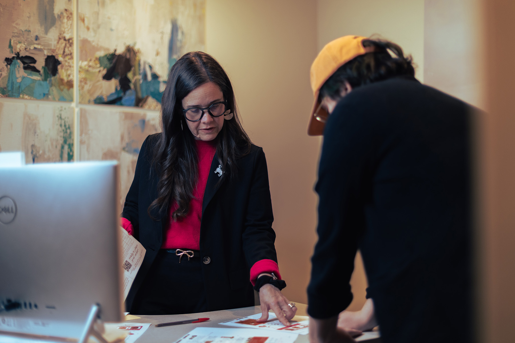 an hr leader giving guidance to a subordinate