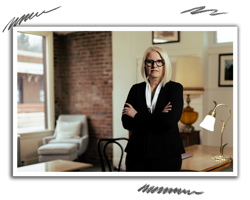vp of hr standing confidently in front of desk