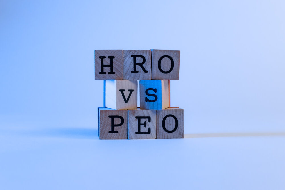 letter blocks that spell HRO vs PEO