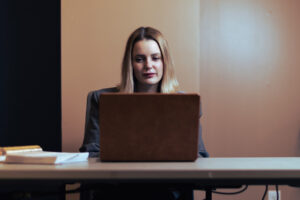 hr manager working diligently on evaluating hr technology systems