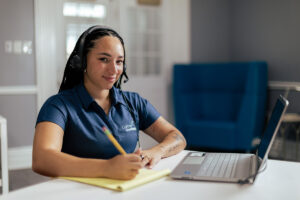 HEROES team member helps a customer manage open enrollment